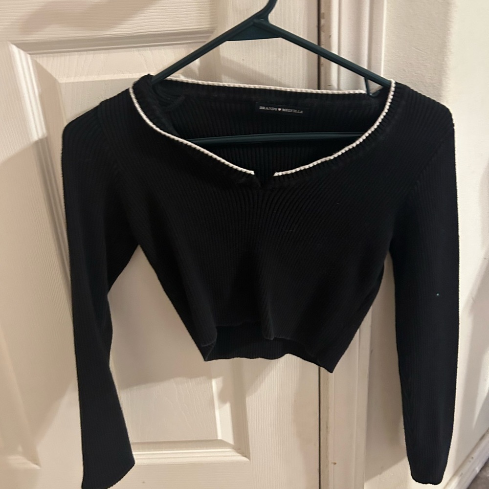 Randy Melville black shirt